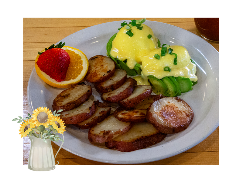 Avocado Eggs Benedict at Sunflower Bakery and Cafe